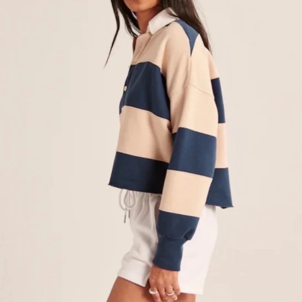 Abercrombie and Fitch Rugby Shirt in navy/ tan stripes. Size medium.